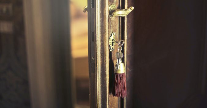 A key in a door sightly ajar